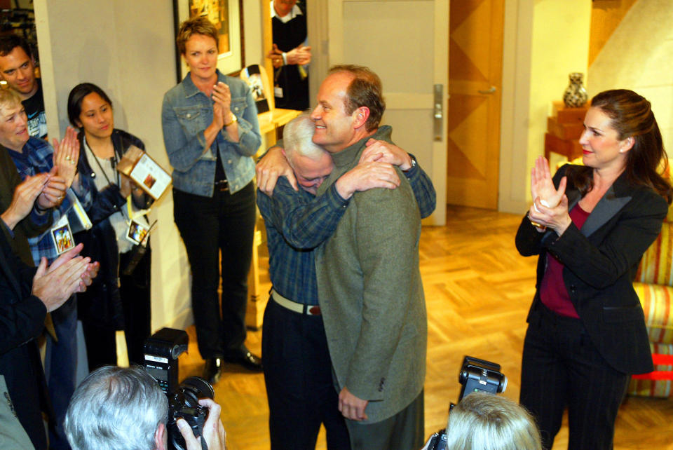 Grammer and Mahoney hug during the final taping of "Frasier" on March 23, 2004. (Photo: Ken Hively/Los Angeles Times via Getty Images)