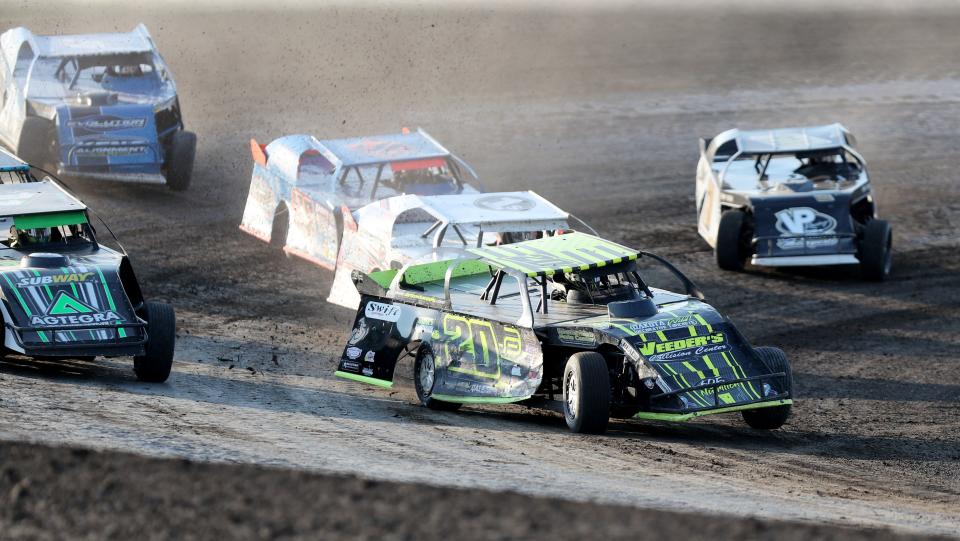 Trevor Anderson of Watertown takes an early lead during a July 2021 modified race at Brown County Speedway in Aberdeen. The 2022 season opens Friday night.