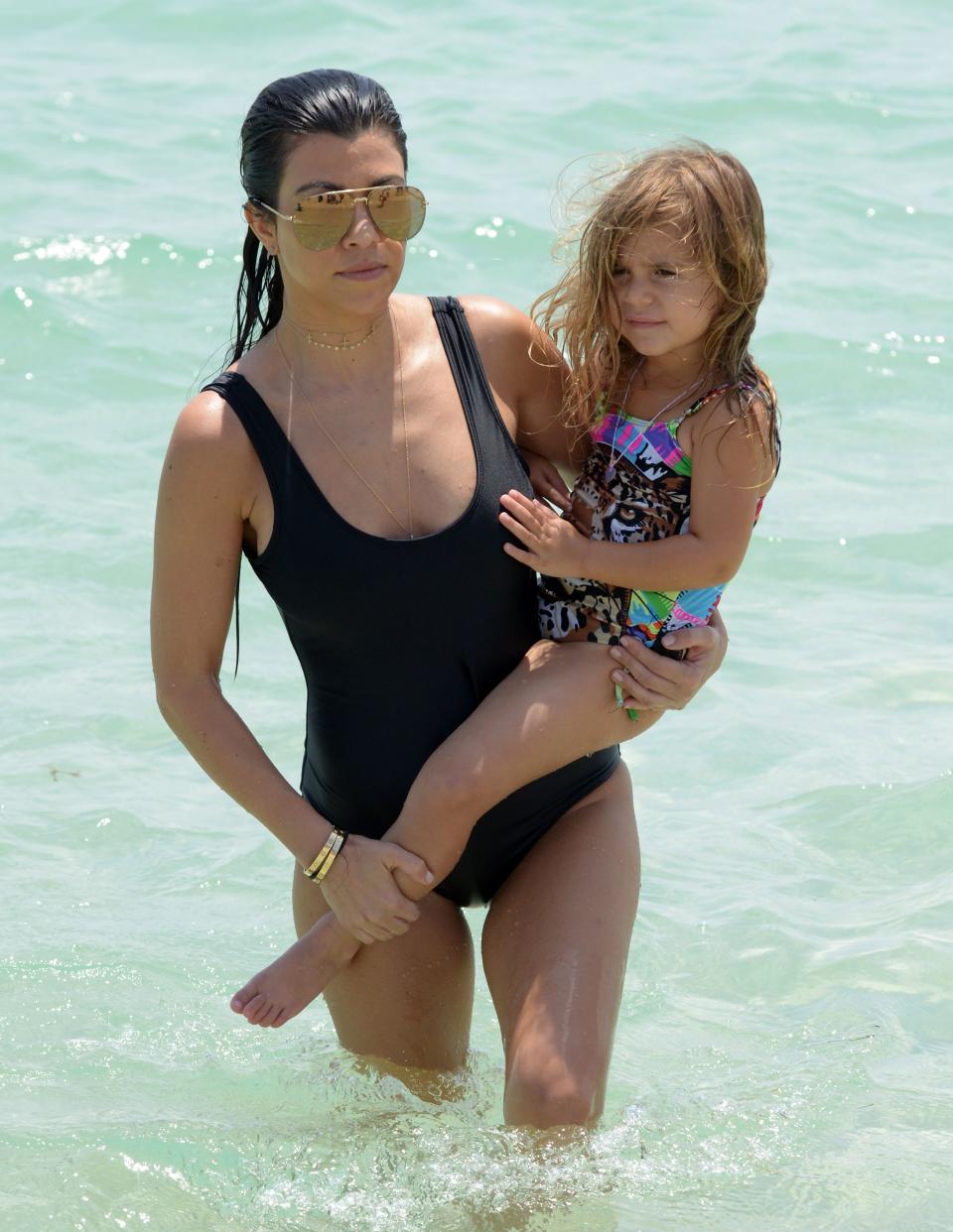 Kourtney Kardashian and daughter Penelope in the ocean