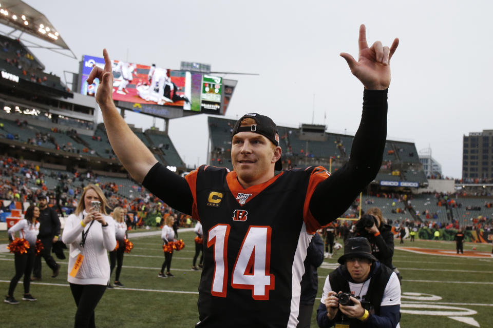 Cincinnati Bengals quarterback Andy Dalton celebrates after the Bengals defeated the Cleveland Browns 33-23 in an NFL football game, Sunday, Dec. 29, 2019, in Cincinnati. (AP Photo/Gary Landers)