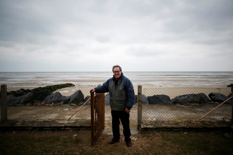 Serge Letourneur, a former train driver, near his beach house on the channel who took early retirement from a job for life at age 50