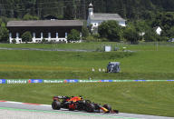 Red Bull driver Max Verstappen of the Netherlands steers his car during the first practice session for the Styrian Formula One Grand Prix at the Red Bull Ring racetrack in Spielberg, Austria, Friday, July 10, 2020. The Styrian F1 Grand Prix will be held on Sunday. (Joe Klamar/Pool via AP)