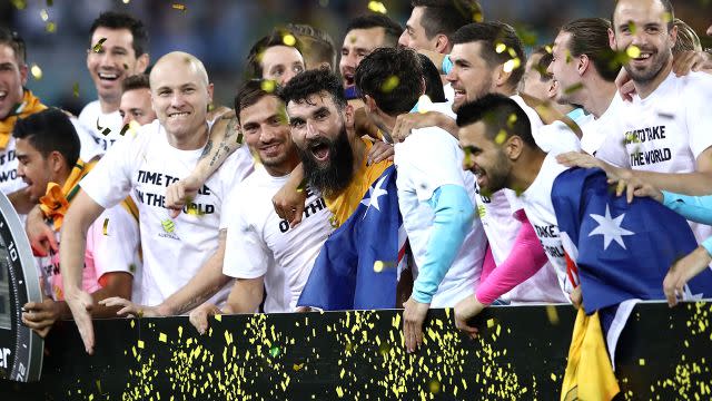 The Socceroos celebrate their achievement. Image: Getty