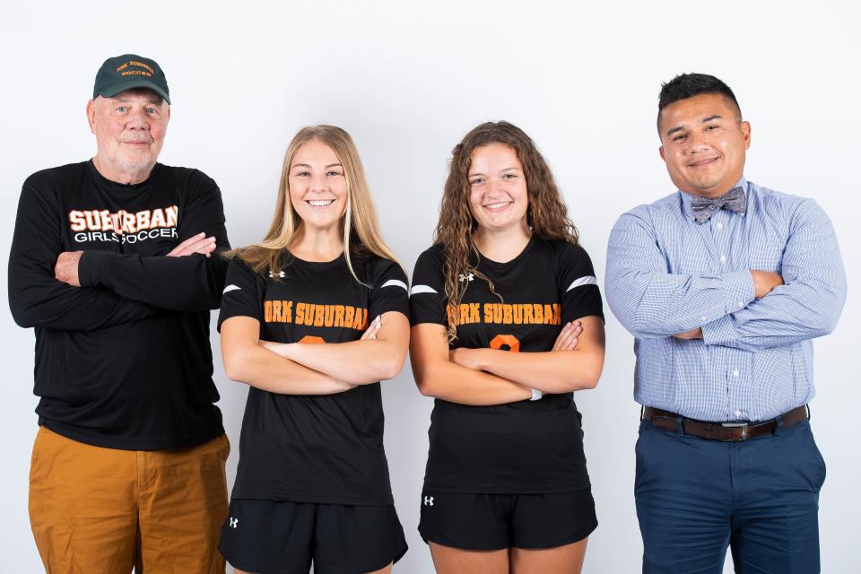 (From left) York Suburban soccer head coach Tom Shugars poses for a photo with players Kirra Hyder and Cecelia Sigley, as well as assistant coach Jose del Pielagio, during YAIAA fall sports media day on Thursday, August 3, 2023, in York.