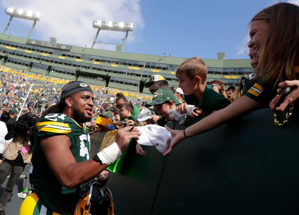 Green Bay Packers linebacker Keshawn Banks (51) signs autographs for fans after a preseason football game against the Seattle Seahawks on Saturday, August 26, 2023, at Lambeau Field in Green Bay, Wis.