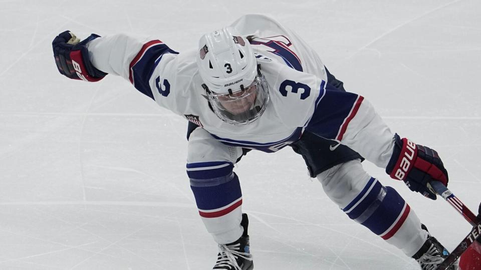 United States' Cayla Barnes does some stick checking.