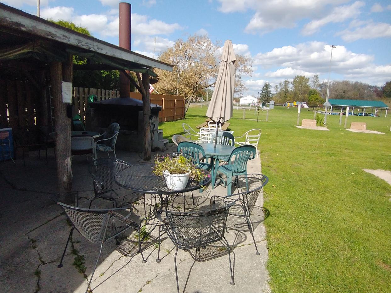 Linda Hunter, owner of The Pink Elephant bar in Smiths Creek, set up an outdoor area for customers to use during the summer. Due to the smell coming from the local landfill, however, no one uses it anymore.