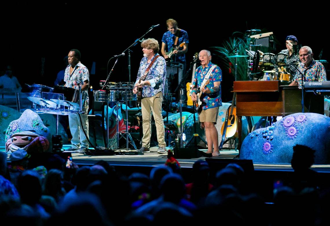 Jimmy Buffett and his Coral Reefer Band perform during their concert at the iTHINK Financial Amphitheatre in West Palm Beach, Florida on Dec. 9, 2021.