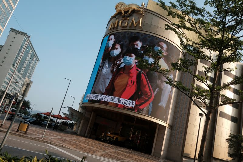 Giant screen shows a public film by the government to promote the prevention of the novel coronavirus disease (COVID-19) following its outbreak, at the MGM Grand Macau resort, in Macau