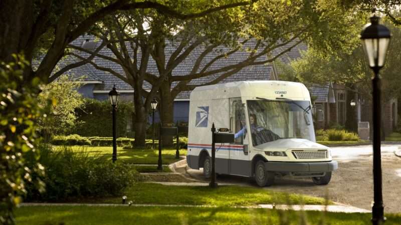 USPS next-generation delivery vehicle parked on a residential street.