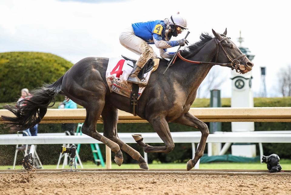 Zandon, with Flavien Prat up, wins the Blue Grass Stakes on Saturday, April 9, 2022, at Keeneland race course.