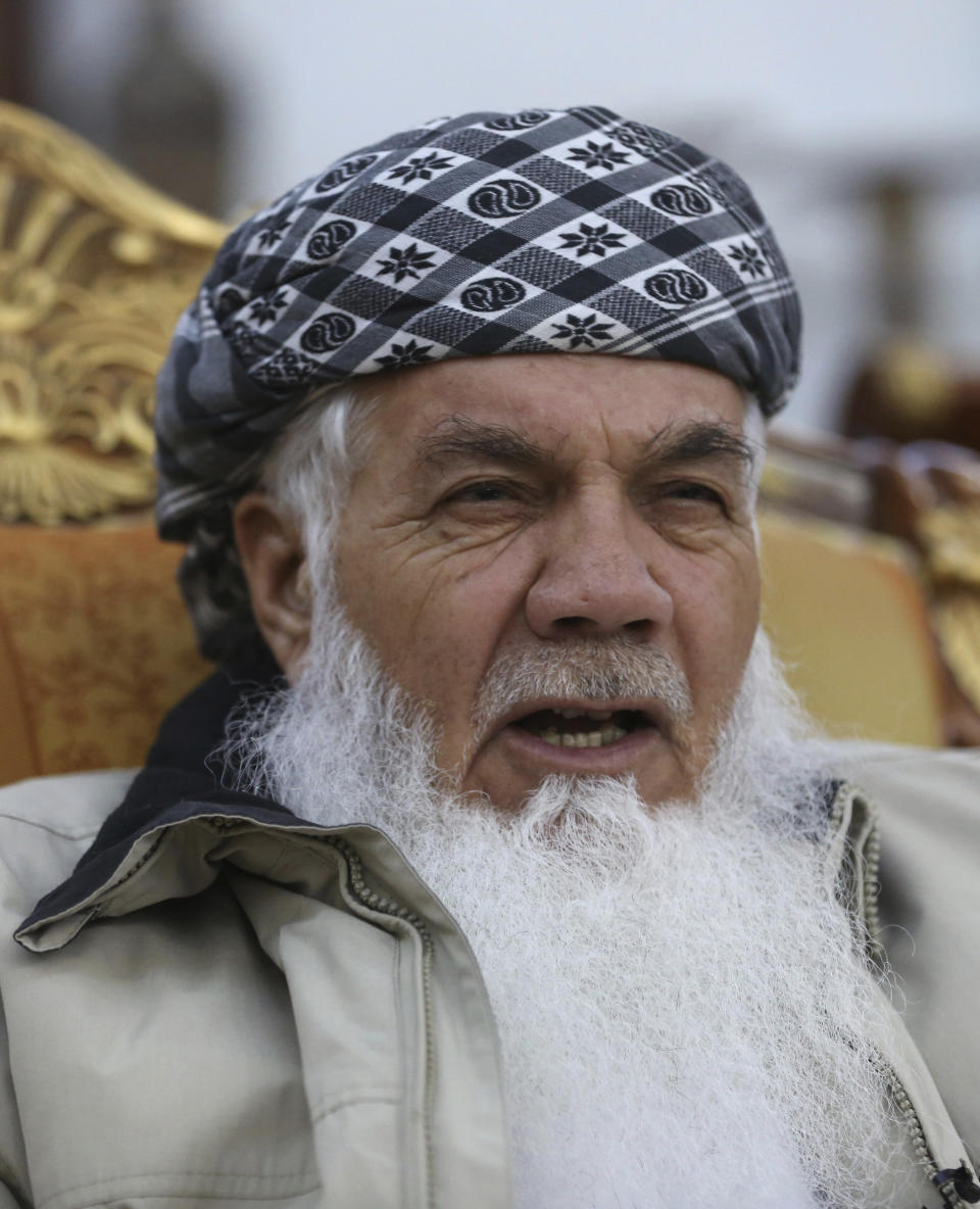 Former Afghan Cabinet Minister Ismail Khan, speaks during an interview with the Associated Press in Herat province, western of, Afghanistan, Wednesday, Feb. 20, 2019. A powerful political leader, who was previously tapped by some to lead Afghanistan’s negotiating team with the Taliban, warned Afghanistan’s president Wednesday against squandering an opportunity to find a peaceful settlement to the country’s latest war that is now into its 18th year. (AP Photo/Rahmat Gul)