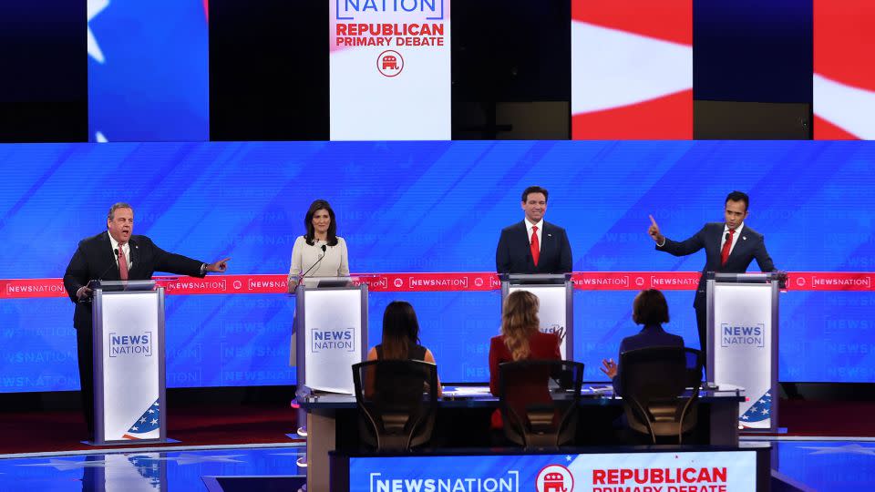 Republican presidential candidates former New Jersey Gov. Chris Christie, former UN Ambassador Nikki Haley, Florida Gov. Ron DeSantis and Vivek Ramaswamy debate at the University of Alabama on December 6. - Justin Sullivan/Getty Images