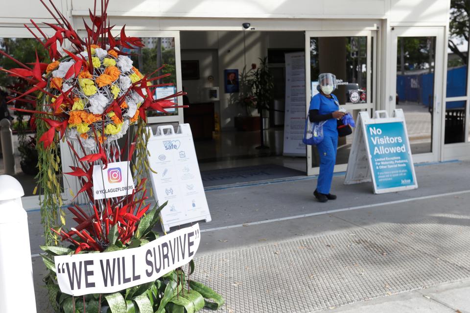 A flower arrangement outside Jackson Memorial Hospital in Miami expresses determination in the face of the pandemic ravaging Florida.