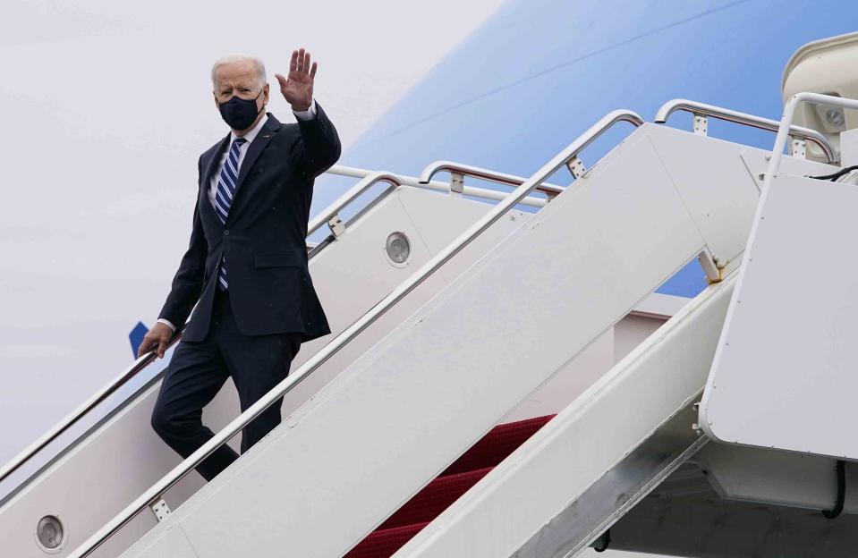 President Joe Biden waves as he arrives on Air Force One, Tuesday March 16, 2021, at Philadelphia International Airport in Philadelphia, Pa. President Biden says New York Gov. Andrew Cuomo should resign if the state attorney general's investigation confirms the sexual harassment allegations against him. (AP Photo/Carolyn Kaster)