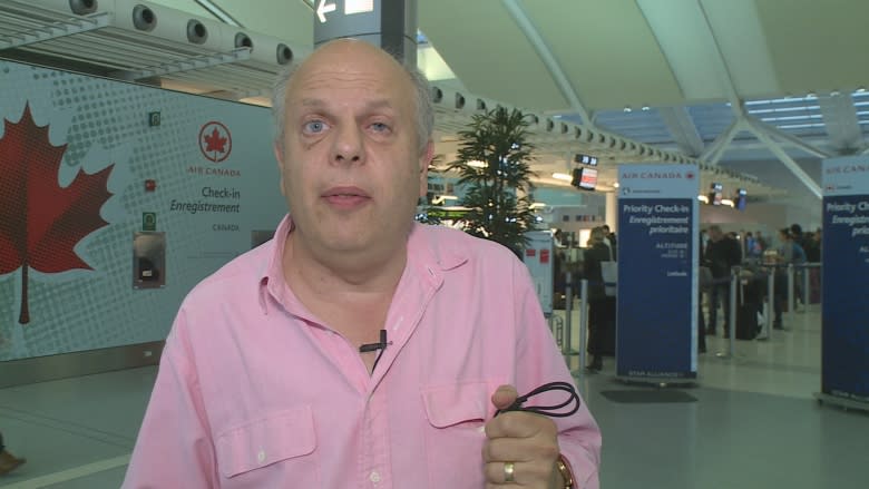 Blind passenger alleges he was left at the curb by Air Canada and airport authority