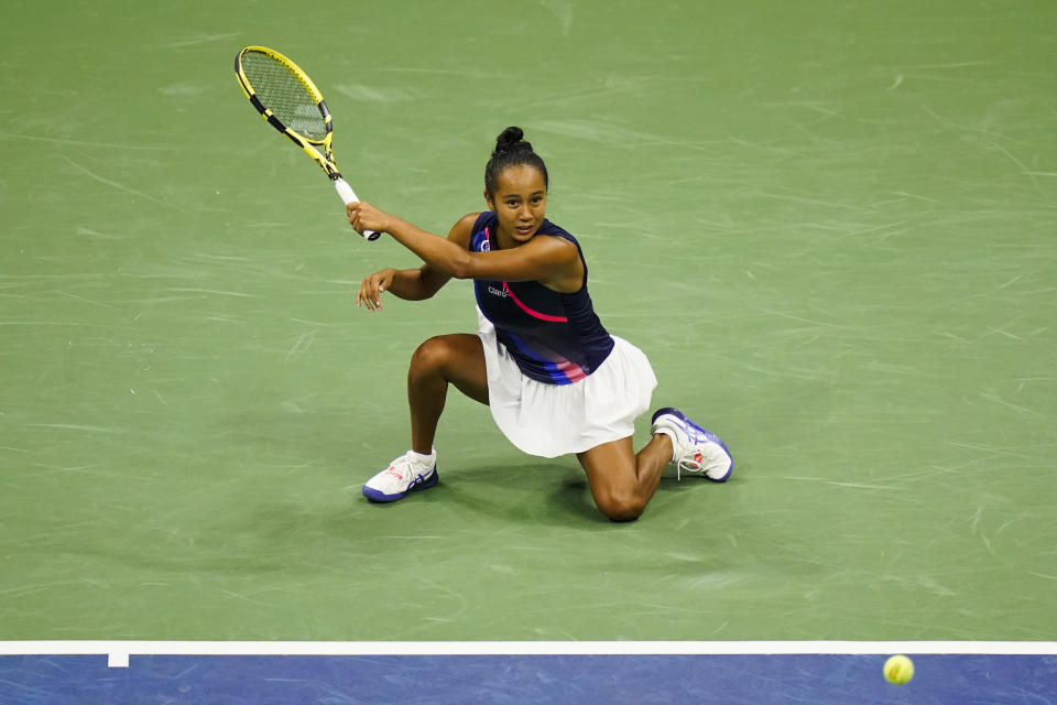 Leylah Fernandez, of Canada, returns a shot to Naomi Osaka, of Japan, during the third round of the US Open tennis championships, Friday, Sept. 3, 2021, in New York. (AP Photo/Frank Franklin II)