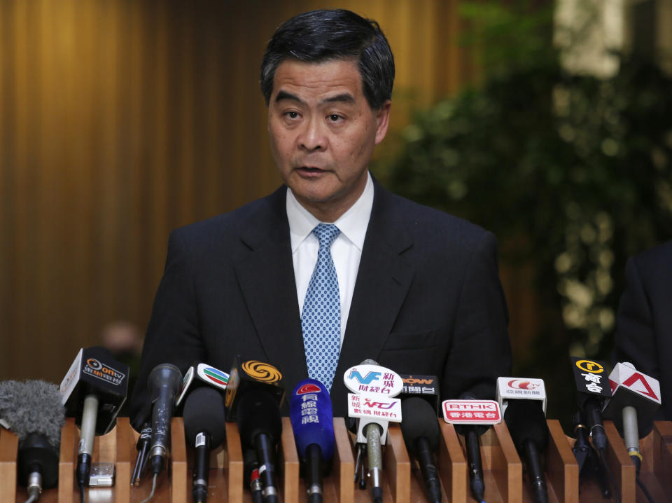 Hong Kong's chief executive Leung Chun-ying listens to reporters' questions during a press conference announcing that holders of official Philippine government passports will no longer be allowed to visit for 14 days without visas starting Feb. 5, in Hong Kong Wednesday, Jan. 29, 2014. Hong Kong is making it harder for Philippine officials to visit because their government has not apologized for the deaths of eight Hong Kong tourists nearly four years ago. (AP Photo/Vincent Yu)