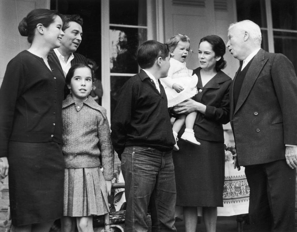 Charlie Chaplin (right) and his wife Oona O’Neill (second from right), with their children Geraldine, Sydney, Josephine, Michael, and Jane (left to right) (Daily Express/Archive Photos/Getty Images)