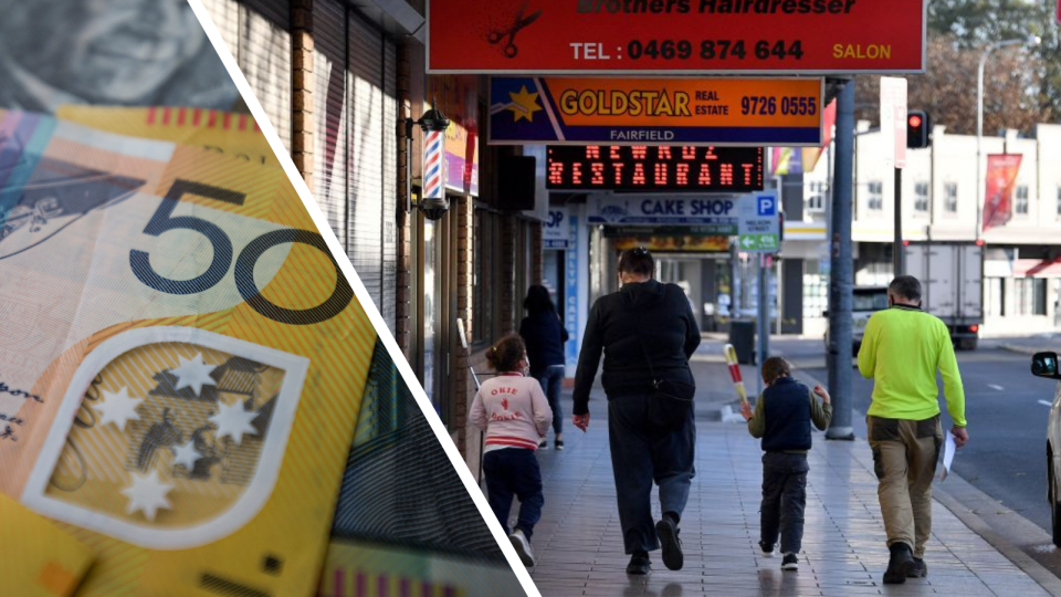 Australian $50 notes. People walking down deserted street during Sydney's lockdown.