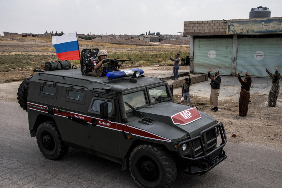 Russian military patrols near Syrian and Turkish border in north Syria, Friday. Oct. 25, 2019. (AP Photo/Baderkhan Ahmad)