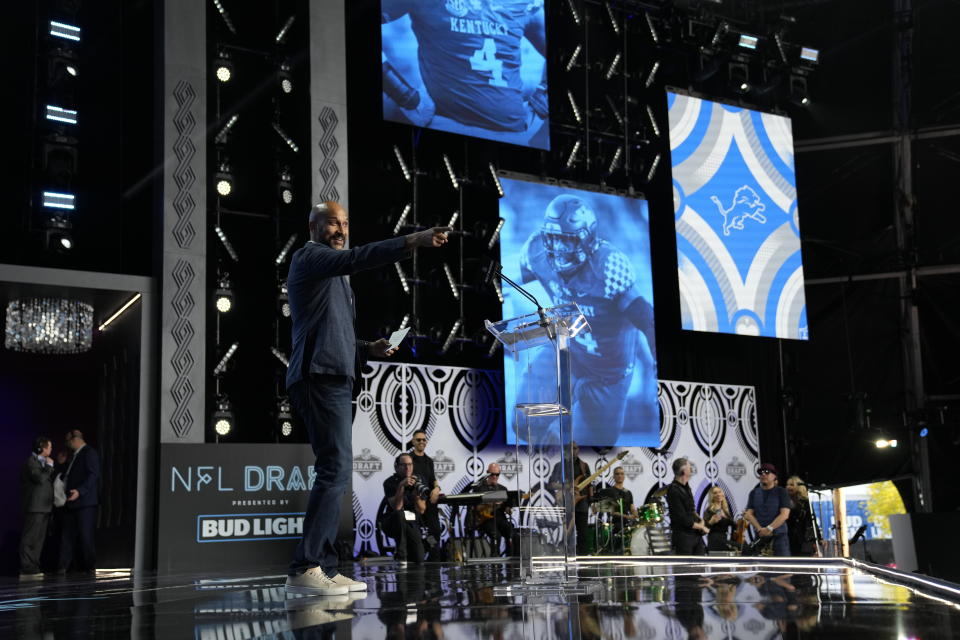 Actor and comedian Keegan-Michael Key announces Kentucky defensive end Josh Paschal as the Detroit Lions selection during the second round of the NFL football draft Friday, April 29, 2022, in Las Vegas. (AP Photo/John Locher)