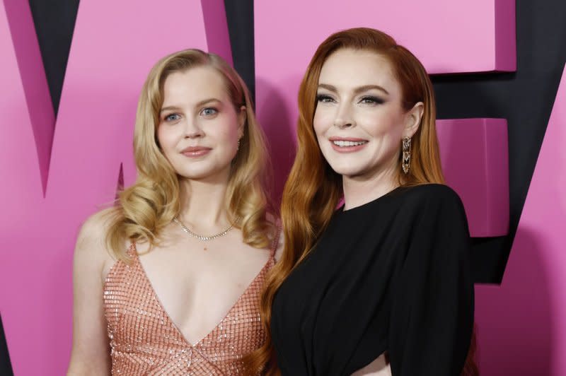 Lindsay Lohan (R) and Angourie Rice attend the New York premiere of "Mean Girls" on Monday. Photo by John Angelillo/UPI