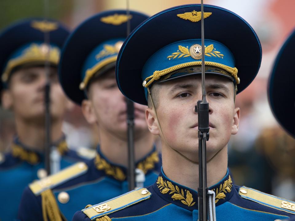 <p>Russians stand during the Victory Day military parade to celebrate 74 years since the victory in WWII in Red Square in Moscow, Russia, Thursday, May 9, 2019. Putin told the annual military Victory Day parade in Red Square that the country will continue to strengthen its armed forces. (AP Photo/Alexander Zemlianichenko) </p>