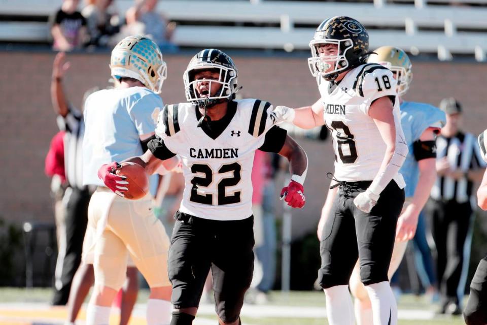 Daniel’s JaQuarius Mayrant 22 celebrates scoring against Camden at Benedict College on Friday, December 3, 2021.