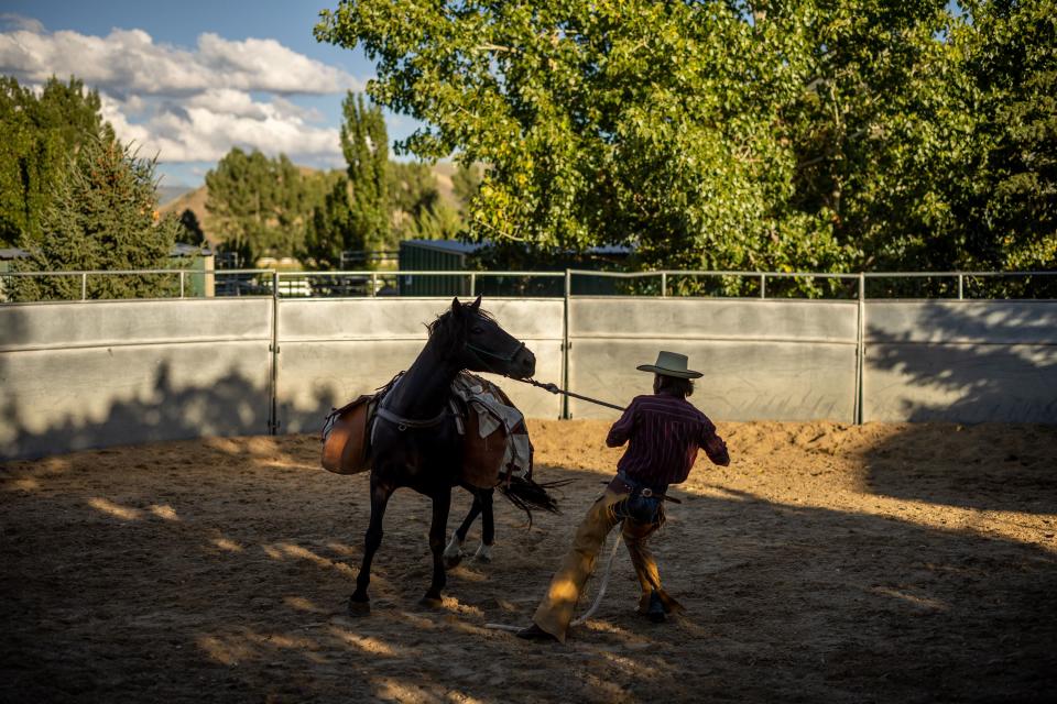 Jake Harvath works with his horse Denver at Sage Creek Equestrian in Charleston, Wasatch County, on Tuesday, Sept. 5, 2023, as he prepares to embark on a yearlong cross-country horse ride. | Spenser Heaps, Deseret News