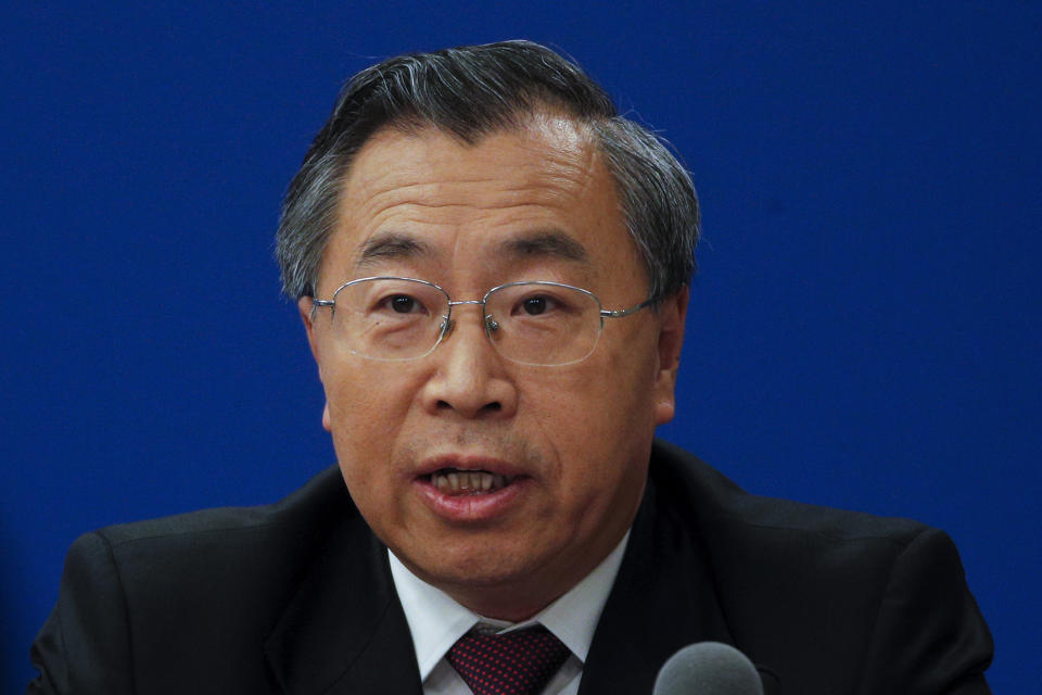 Liu Jingzhen, chairman of state-owned SinoPharm Group, speaks during a news conference of the Joint Prevention and Control Mechanism of the State Council at the National Health Commission in Beijing, Tuesday, Oct. 20, 2020. The state-owned Chinese drugmaker is setting up production lines to supply 1 billion doses of two possible coronavirus vaccines that are being tested on 50,000 people in 10 countries, Liu said. (AP Photo/Andy Wong)