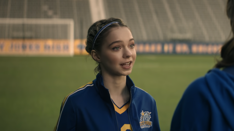 Emma Myers in a soccer uniform during Family Switch