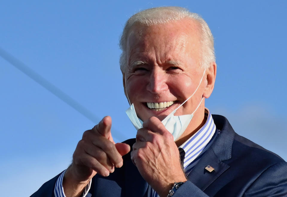 TOPSHOT - Democratic presidential nominee and former Vice President Joe Biden speaks at a Drive-In event with Bon Jovi at Dallas High School, Pennsylvania, on October 24, 2020. (Photo by Angela Weiss / AFP) (Photo by ANGELA WEISS/AFP via Getty Images)