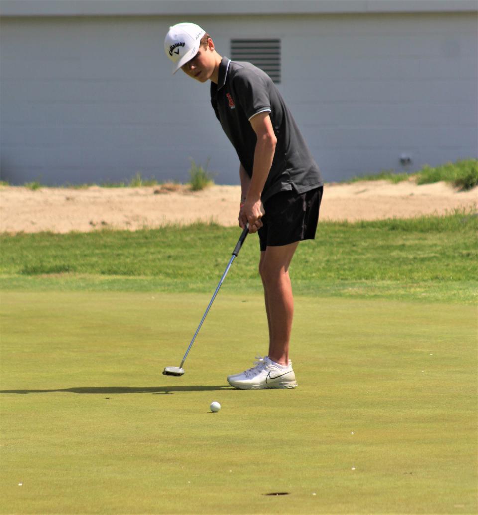 Frank Soss of Bedford sinks a putt on the final hole of the Monroe County Championship Monday, May 16, 2022 at Monroe Golf & Country Club.