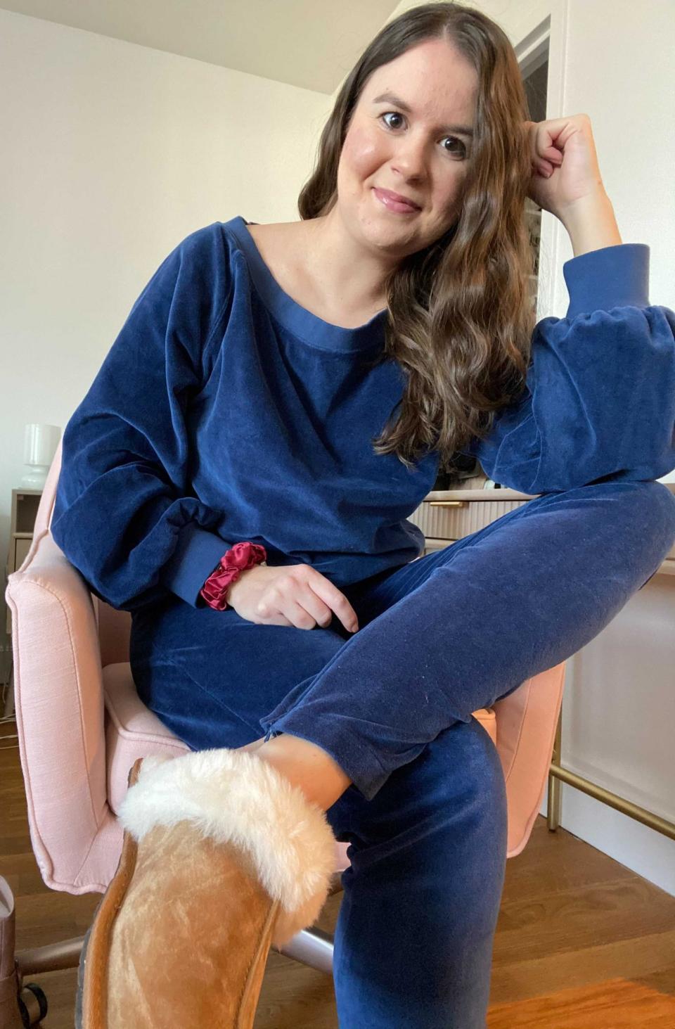 <p><strong><em>Colleen Kratofil, Style Editor</em>:</strong> When I say I gravitated towards this sweatsuit because of the name — I'm not joking. There's something about wearing the "Disco" sweatshirt and track pant that sounded way more festive than throwing on another cotton pullover for the 200th day in a row. Even though I am not traveling to see family this holiday, I'm excited to wear this set (Ugg slippers too!) on the many Zoom calls I'll be on throughout the day. </p> <p>The neckline is slouchy and cool, the velour fabric gives it a retro touch and the track pants are well-fitted and incredibly comfy. I can easily make a grocery store run while looking somewhat put together. Until I can go to a real disco party again, this "Disco" set will have to do.</p> <p><strong>Buy It!</strong> Everybody & Everyone Disco Sweatshirt, $88; <a href="https://everybodyeveryone.com/collections/everyday-lounge/products/disco-sweatshirt" rel="nofollow noopener" target="_blank" data-ylk="slk:everybodyandeveryone.com;elm:context_link;itc:0;sec:content-canvas" class="link ">everybodyandeveryone.com</a>, Disco Track Pant, $108; <a href="https://everybodyeveryone.com/products/disco-track-pant/" rel="nofollow noopener" target="_blank" data-ylk="slk:everybodyandeveryone.com;elm:context_link;itc:0;sec:content-canvas" class="link ">everybodyandeveryone.com</a></p>