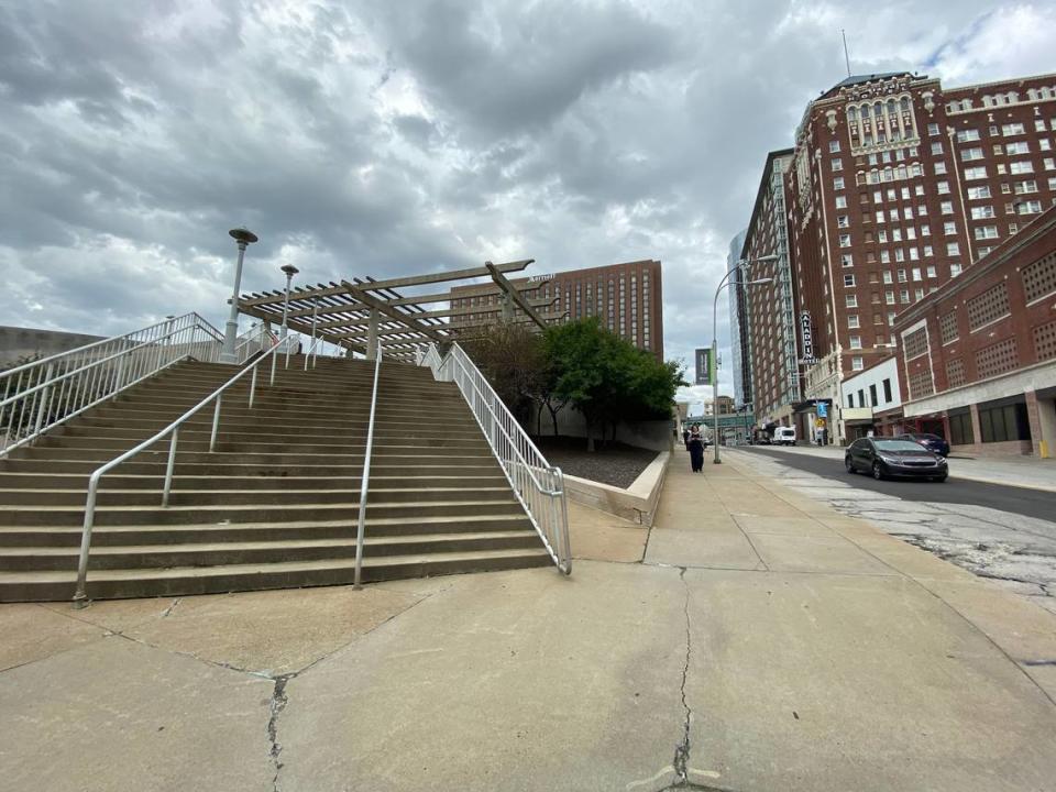 One set of stairs people use to get to the plaza.