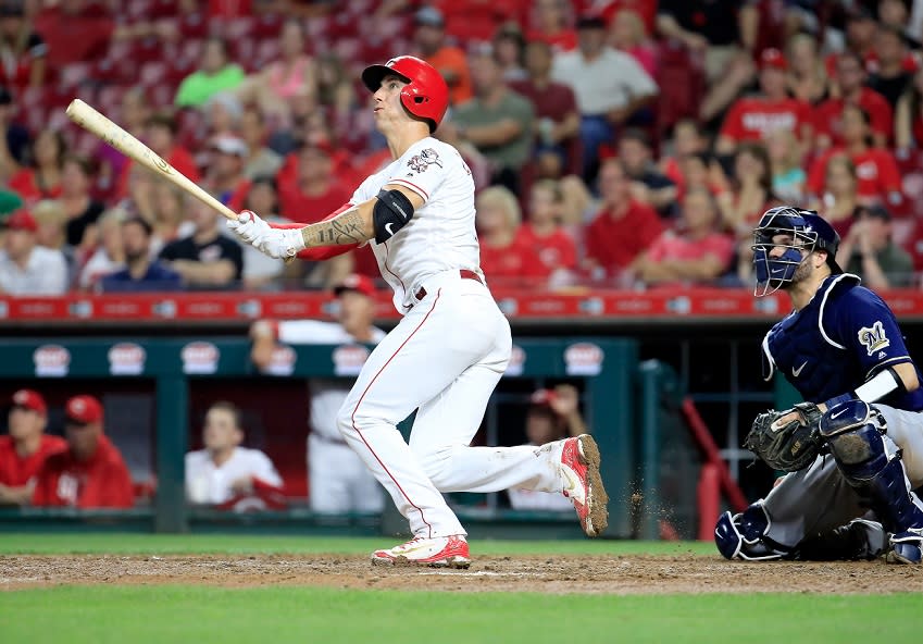 Cincinnati Reds reliever Michael Lorenzen follows through on his fourth home run of the season during Wednesday’s game against the Milwaukee Brewers. (Getty Images)