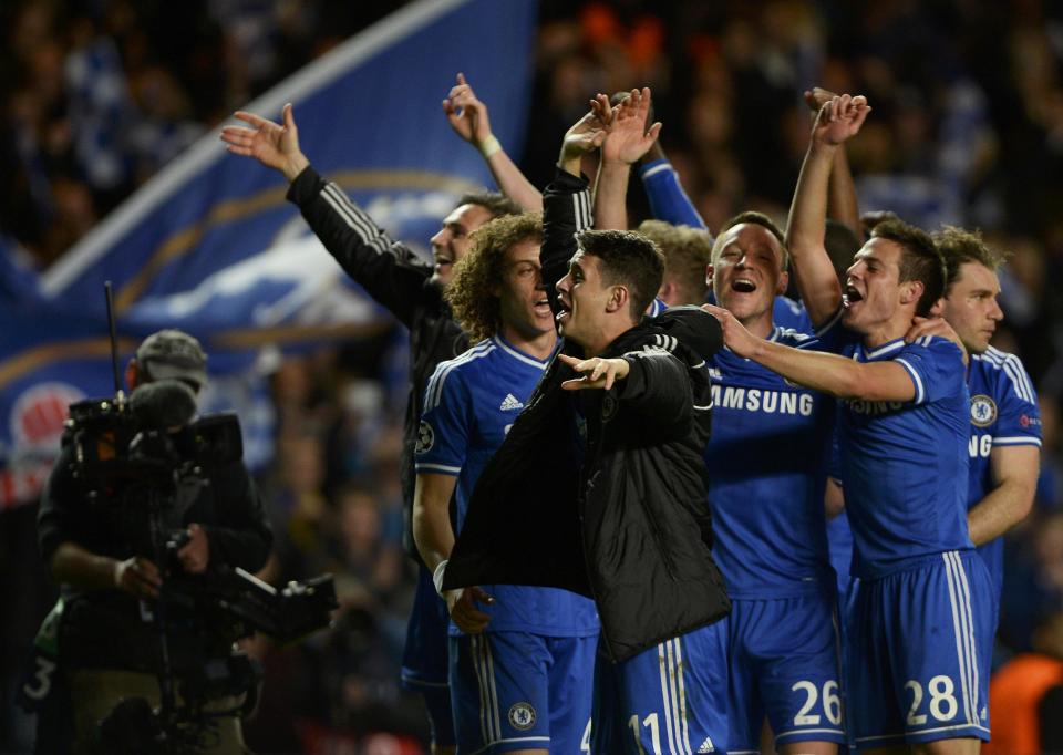 Chelsea players celebrate at the end of their Champions League quarter-final second leg soccer match against Paris St Germain at Stamford Bridge in London