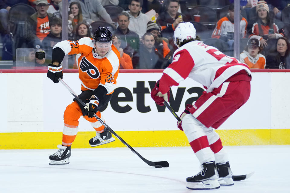 Philadelphia Flyers' Brendan Lemieux, left, shoots the puck against Detroit Red Wings' Moritz Seider during the second period of an NHL hockey game, Sunday, March 5, 2023, in Philadelphia. (AP Photo/Matt Slocum)