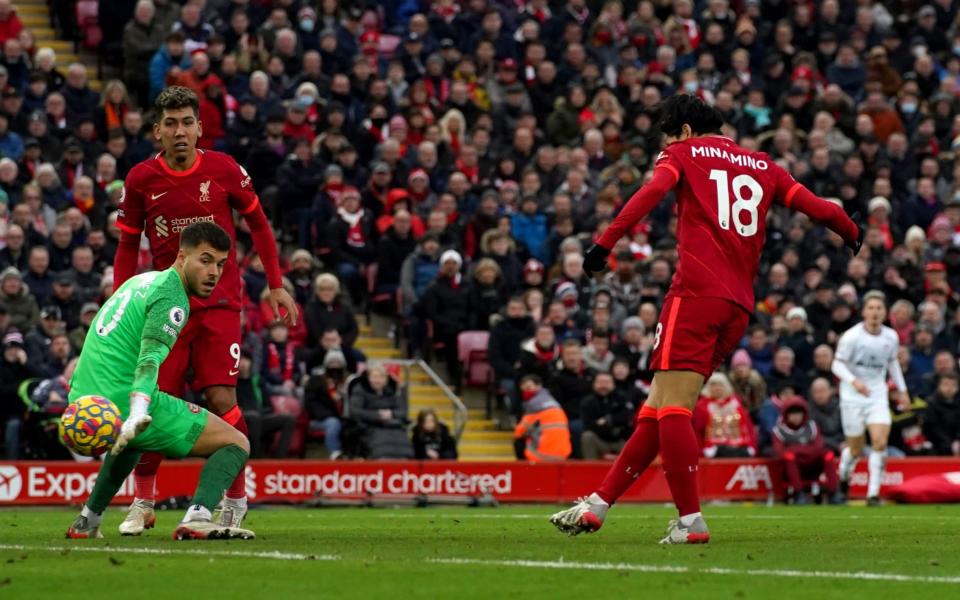 Liverpool's Takumi Minamino pounces on Brentford's defensive mishap to get himself a birthday goal - and seal the match - Peter Byrne/PA Wire