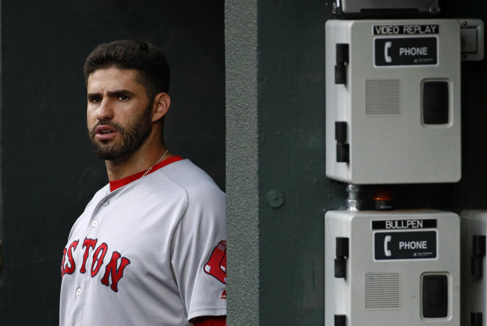 Instead of talking about the triple crown or the AL East pennant, J.D. Martinez found himself answering questions about Hitler and guns on Tuesday. (AP)