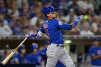 Jul 14, 2018; San Diego, CA, USA; Chicago Cubs second baseman Javier Baez (9) hits a three-run home run during the ninth inning against the San Diego Padres at Petco Park. Mandatory Credit: Jake Roth-USA TODAY Sports