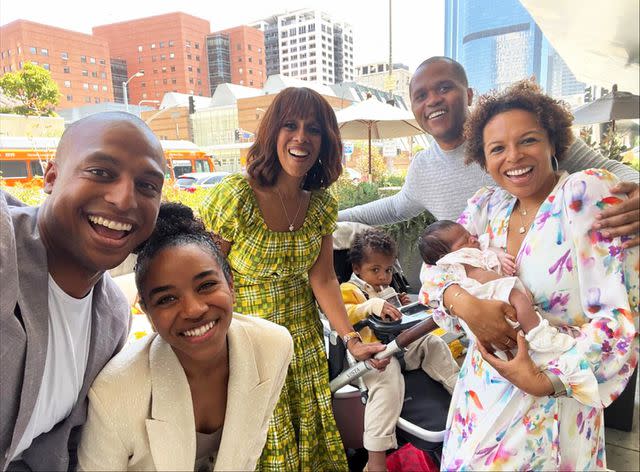 <p>Gayle King/Instagram</p> Gayle King (center) and her family pose with her newborn granddaughter Grayson