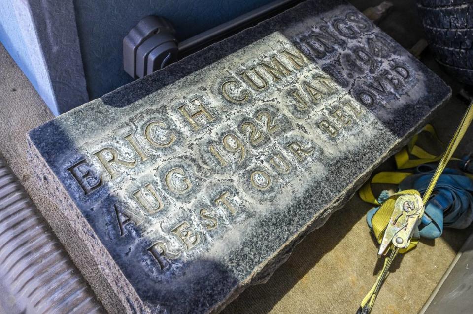 The weathered headstone that rested above Eric Cummings’ grave sits in the back of Barry Cummings’ SUV before being transported to a family cemetery in Everton, Missouri on Wednesday, April 10, 2024. Eric Cummings died tragically in 1941 and has been buried at the Sanger Cemetery ever since. His nephew, Barry Cummings came up with the idea of having the body moved to Missouri, which his family agreed with.