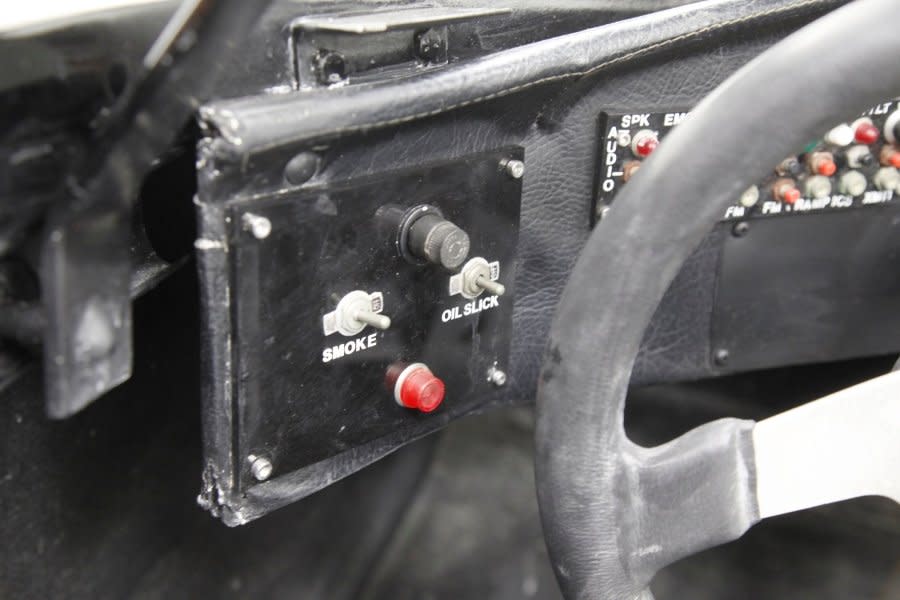 Buttons inside the cockpit of a Batmobile up for auction