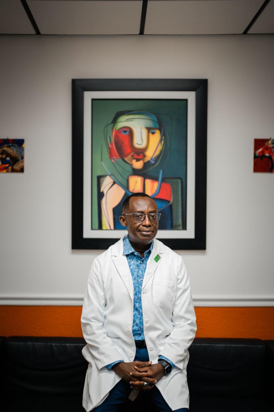 Dr. Saint Anthony Amofah looks at the camera as he poses for a portrait