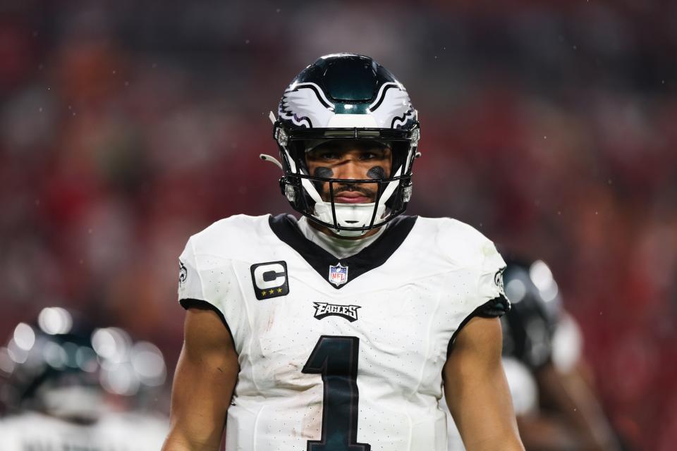 Jan 15, 2024; Tampa, Florida, USA; Philadelphia Eagles quarterback Jalen Hurts (1) looks on during the first half of a 2024 NFC wild card game against the Tampa Bay Buccaneers at Raymond James Stadium. Mandatory Credit: Nathan Ray Seebeck-USA TODAY Sports
