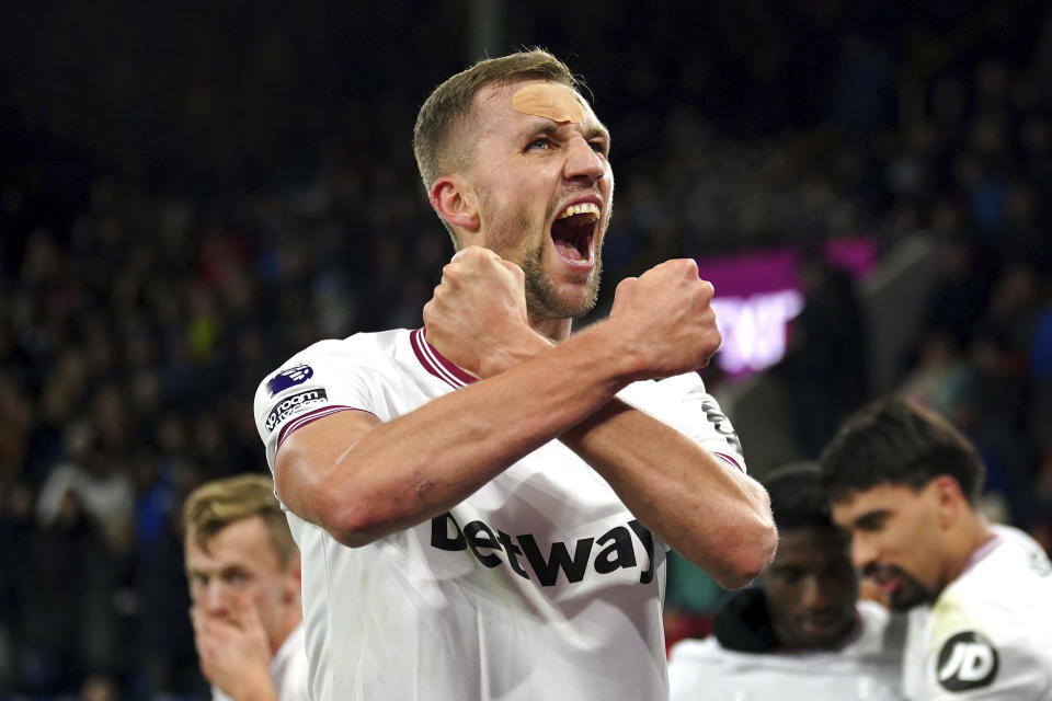 West Ham United's Tomas Soucek celebrates scoring their side's second goal of the game during the English Premier League soccer match between Burnley and West Ham United at Turf Moor, in Burnley, England. Saturday, Nov. 25, 2023. (Peter Byrne/PA via AP)