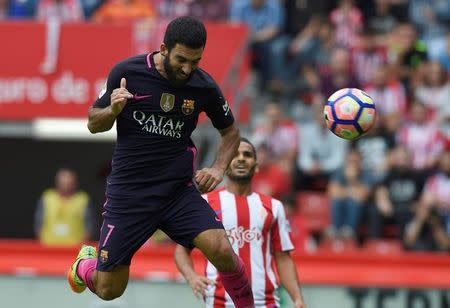 Football Soccer - Sporting Gijon v Barcelona - Spanish La Liga Santander - El Molinon stadium, Gijon, Spain- 24/09/16. Barcelona's Arda Turan scores a goal. REUTERS/Eloy Alonso