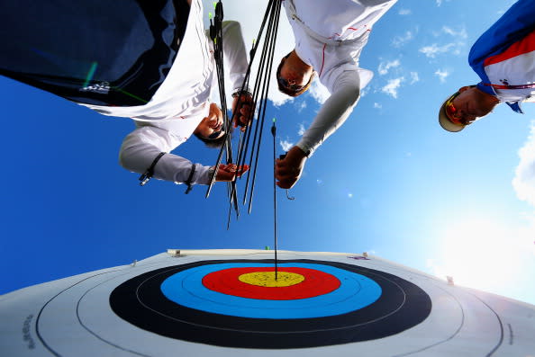 Im Dong-Hyun of Korea retreives arrows from the board during practice ahead of the Men's Individual Archery on Day 3 at Lord's Cricket Ground on July 30, 2012 in London, England. (Photo by Paul Gilham/Getty Images)